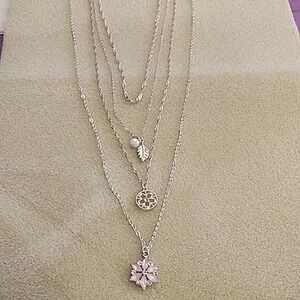 Claire's silvertone multi-strand necklace with pink flower‎ pendant